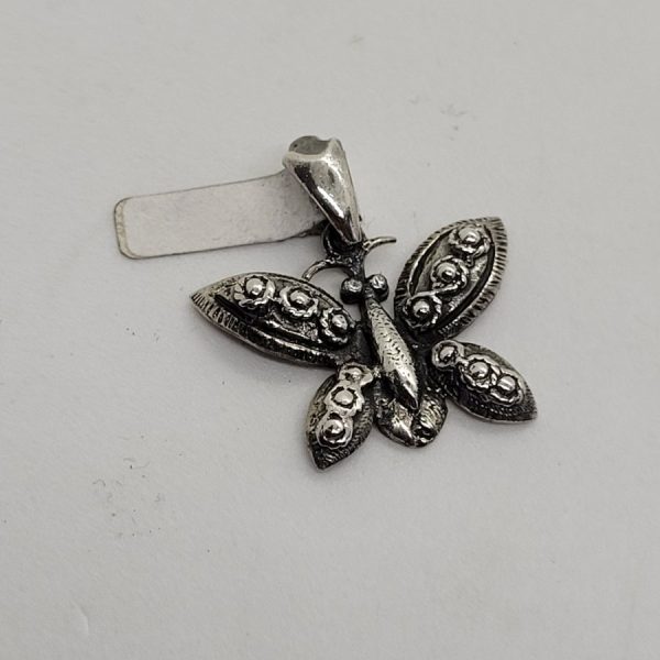 Handmade butterfly sterling silver pendant three  dimension forming a butterfly. Dimension butterfly 2.3 cm X 2.3 cm X 0.3 cm approximately.
