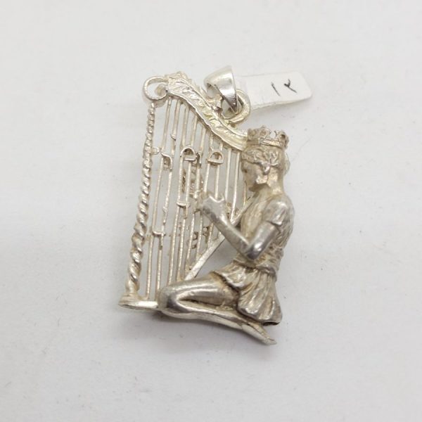 Handmade sterling silver King David playing harp pendant, David's harp on each side of harp is written " David's Psalm" in Hebrew & English.