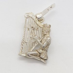 Handmade sterling silver King David playing harp pendant, David's harp on each side of harp is written " David's Psalm" in Hebrew & English.