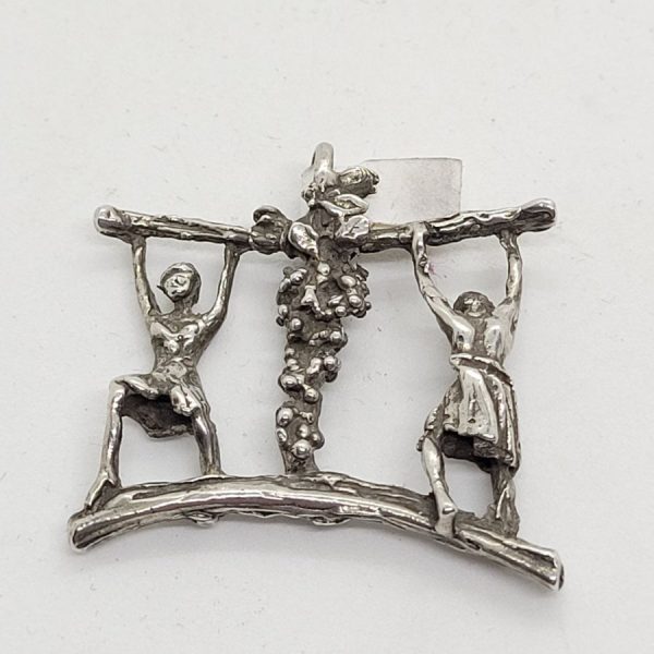 Handmade sterling silver Joshua and Caleb pendant carrying the grapes while spying the Holy Land made by S. Ghatan, 3.4 cm X 3.2 cm X 0.5 cm approximately.