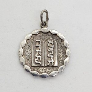 Handmade sterling round ten commandments pendant made by S. Ghatan. Dimension 2.7 cm X 3.6 cm X 1.6 cm approximately.