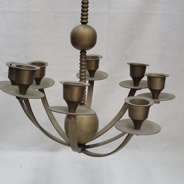 Brass Menorah vintage handmade hanging menorah from Poland early 20th century. They used a solitaire candle as the Shamash ( servant in Hebrew).