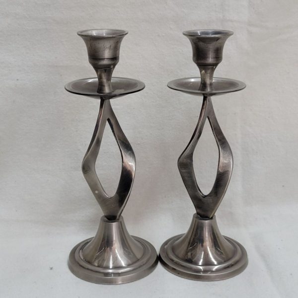 Handmade Sabbath Candlesticks Pewter Plated, clean metal with no ornaments , but a artistic twisted metal design diameter 7 cm X 17.2 cm approximately.