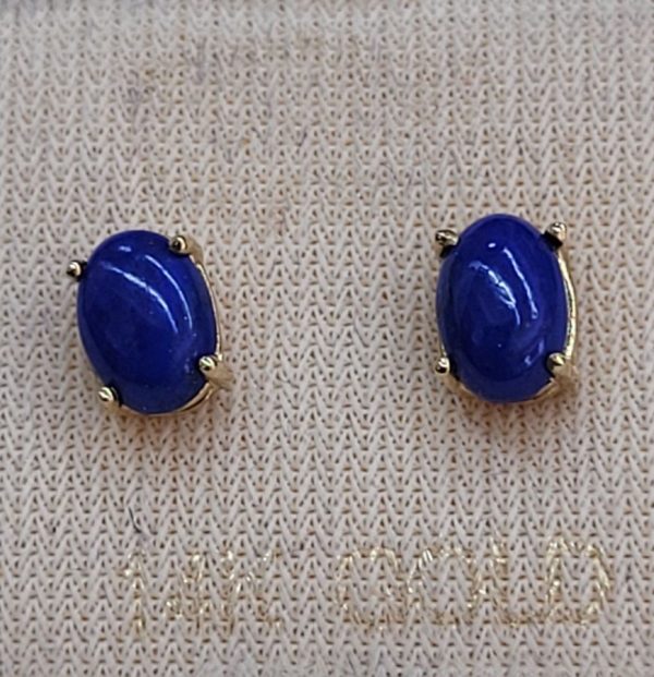 Handmade 14 carat gold cabochon Lapis Lazuli stud earrings set with two cabochon deep blue stones handmade.   Dimension 0.4 cm X 0.6 cm approximately.