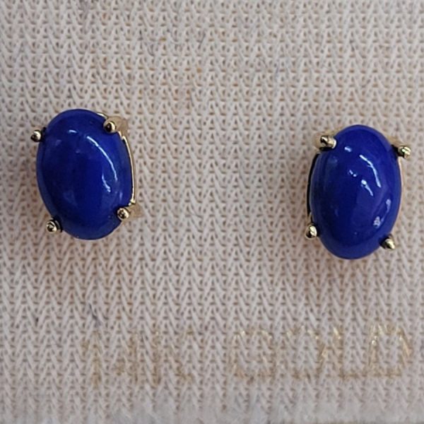 Handmade 14 carat gold cabochon Lapis Lazuli stud earrings set with two cabochon deep blue stones handmade.   Dimension 0.4 cm X 0.6 cm approximately.