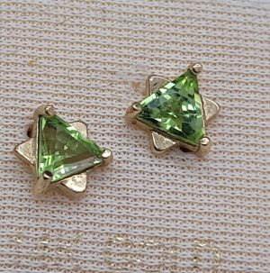 Handmade 14 carat gold MagenDavid stud earrings Peridot set with triangle faceted green Peridot to form a Magen David star shape design.