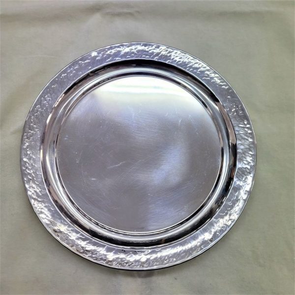 Handmade sterling silver hammered Kiddush Cup Saucer made in Israel. Dimension diameter 22 cm X inside saucer diameter  16 cm approximately.