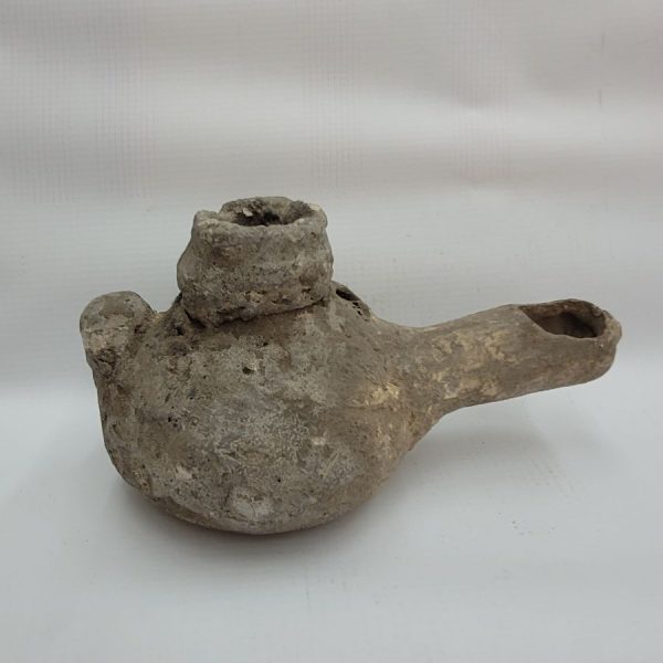Genuine antique Roman pottery oil lamp early Roman Era era. It is from private collection. Dimension 7.5 cm X 15 cm X  7 cm approximately.