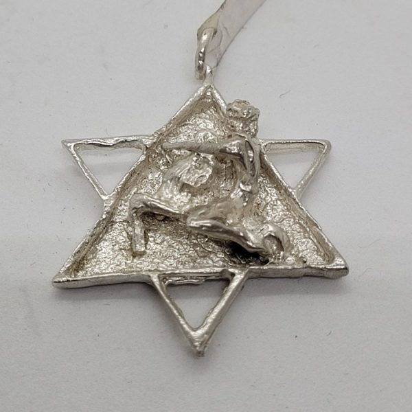 Handmade sterling silver Magen David killing lion pendant like it is described in the holly bible. Dimension 4.2 cm X 3.3 cm X 0.5 cm approximately.