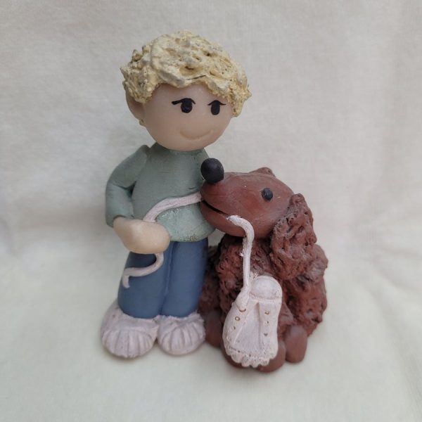 Handmade ceramic sculpture poodle dog and boy made in 1980's by Sakolovsky . There are more various characters in stock of her creations.