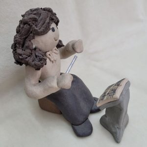 Handmade ceramic sculpture Maestro girl and music stand made in 1980's by Sakolovsky. There are more various characters in stock of Sakolovsky creations.