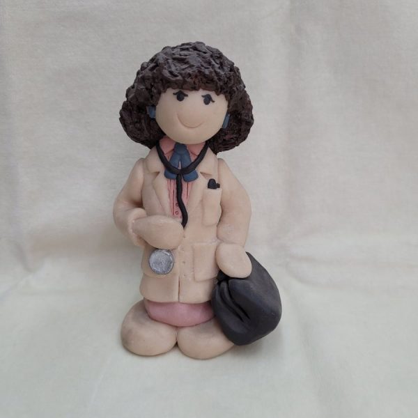 Handmade woman doctor ceramic sculpture made in 1980's by Sakolovsky . There are more various characters in stock of her creations.