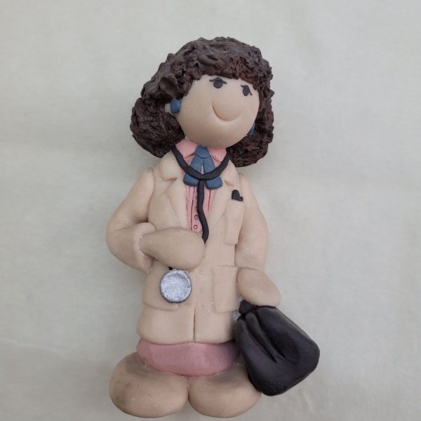 Handmade woman doctor ceramic sculpture made in 1980's by Sakolovsky . There are more various characters in stock of her creations.
