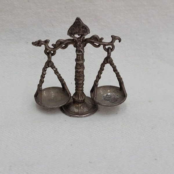 Handmade bronze justice scales miniature sculpture solid heavy metal made in Europe early 2oth century. Dimension 2 cm X 3.8 cm X 4 cm approximately.