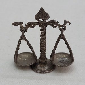 Handmade bronze justice scales miniature sculpture solid heavy metal made in Europe early 2oth century. Dimension 2 cm X 3.8 cm X 4 cm approximately.