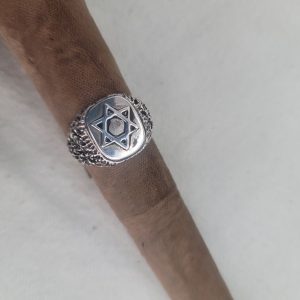 Handmade sterling silver ring Magen David star rough masculine design  suitable for man finger. Dimension 1 cm X 1.5 cm approximately.