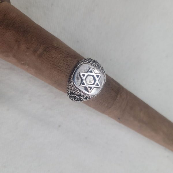 Handmade sterling silver ring Magen David star rough masculine design  suitable for man finger. Dimension 1 cm X 1.5 cm approximately.