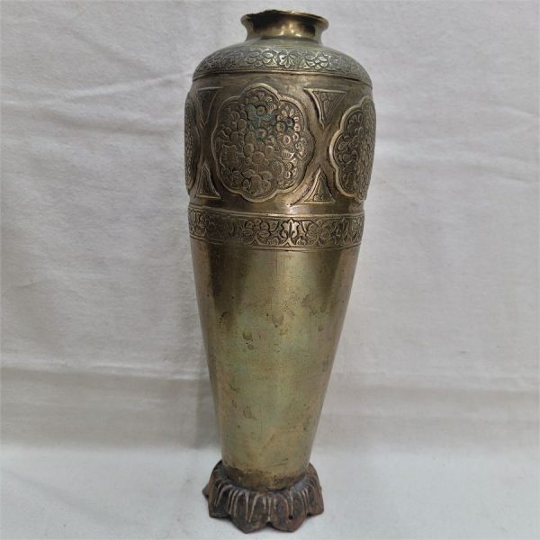 Handmade vintage carved brass vase heavy weight with flower foliage designs  late 19th century middle East. Dimension 27.5 cm X diameter 8 cm approximately.