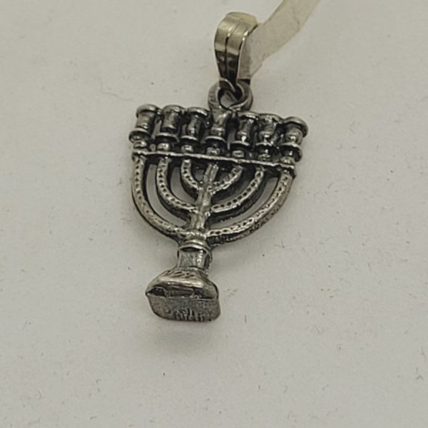 Handmade sterling silver small Menorah pendant with solid base seven branches. Dimension 1.3 cm X 2.2 cm X 0.5 cm approximately.