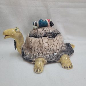 Handmade glazed ceramic box turtle statue made by T. Labok. She has made this turtle statue with a daily use as candy box.
