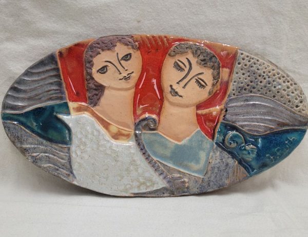 Handmade glazed ceramic oval tile dove David Bathsheba showing the true peaceful love expressed by a white dove 28.5 cm X 15 cm approximately.