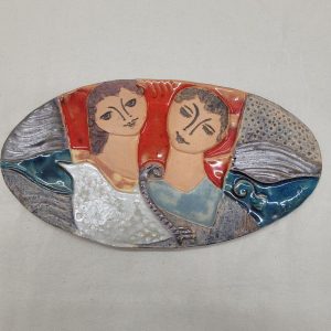Handmade glazed ceramic oval tile dove David Bathsheba showing the true peaceful love expressed by a white dove 28.5 cm X 15 cm approximately.