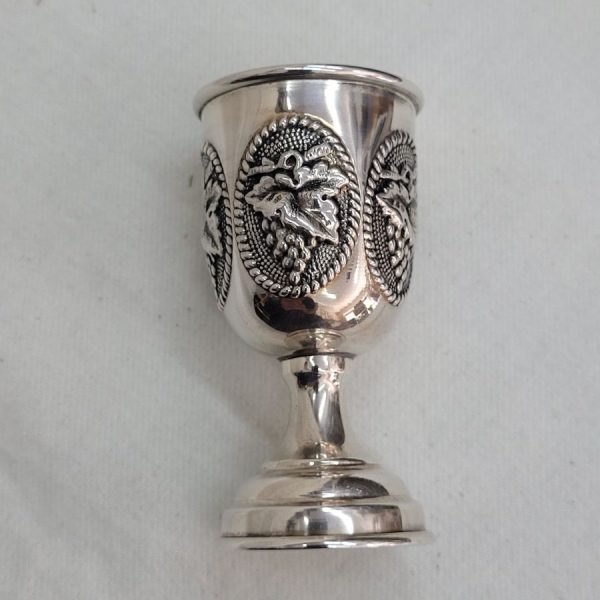 Handmade sterling silver Schnapps grapes leaf small cup, grapes designs embossed all around cup. Dimension diameter 3.7  cm X 7 cm approximately.