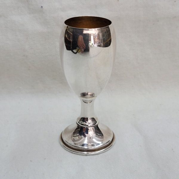Handmade sterling silver schnapps smooth cup designs, smooth silver glamour. 24 carat gold plating inside Kiddush cup to prevent spoiling wine taste.