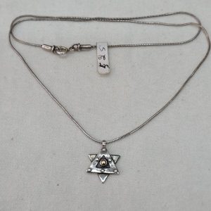 Handmade sterling silver pendant Magen David star, contemporary design oxidized and with snake chain. Dimension star 1.3 cm X  2 cm X 0.28 cm.