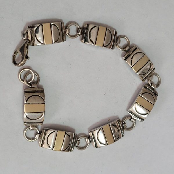 Handmade sterling silver gold bracelet solid ,14 carat gold on each silver bracelet link contemporary style with silver designed rectangular links.