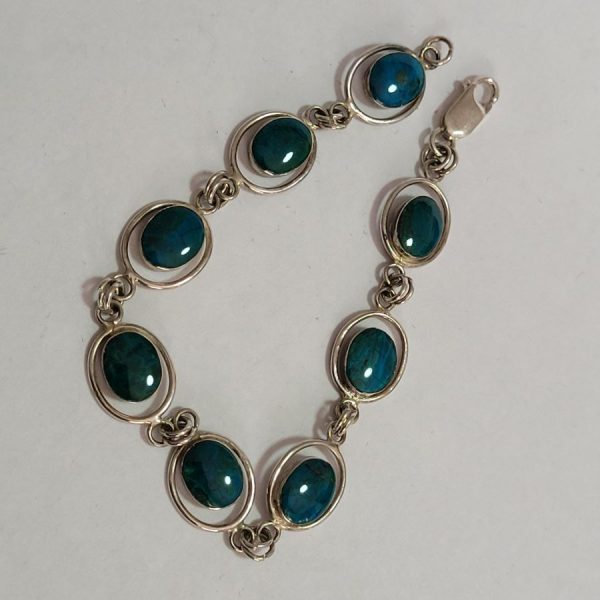 Handmade sterling silver bracelet silver oval Elat stones set with oval silver wire around each link design. Dimension 1.6 cm X 18.8 cm approximately.