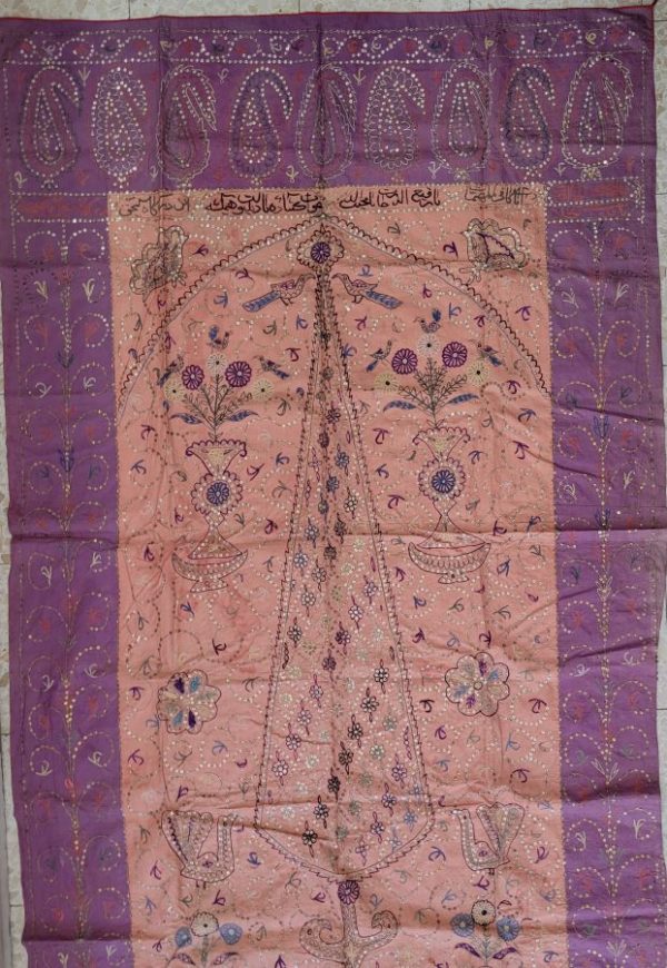 Handmade rectangle cotton Suzani vintage original unusual décor with pine tree, flowers and birds and ornate with small disks on the design.
