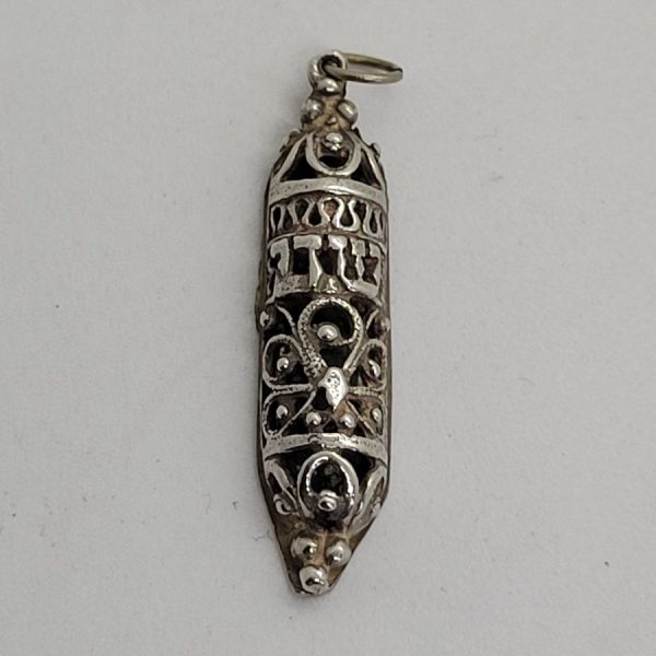 Handmade sterling silver Mezuzah pendant Yemenite Filigree with Shadai ( G-D) in Hebrew. Dimension 0.45 cm X 0.8 cm X 3.9 cm approximately.