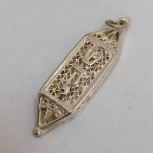 Handmade sterling silver hexagon Mezuzah Yemenite  Filigree pendant with raised letters Shaddai ( G-D) in Hebrew, 1 cm X 0.4 cm X 3.7 cm approximately.