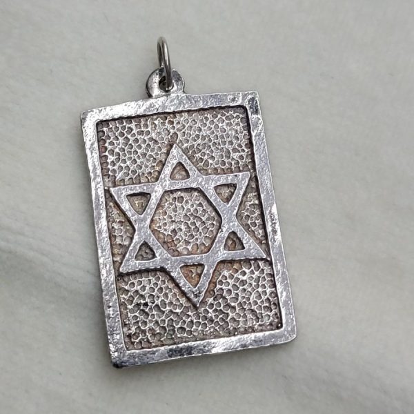 Handmade sterling silver Magen David star rectangle pendant disk with hand hammered back round. Dimension 2.5 cm X 1.7 cm X 0.15 cm approximately.