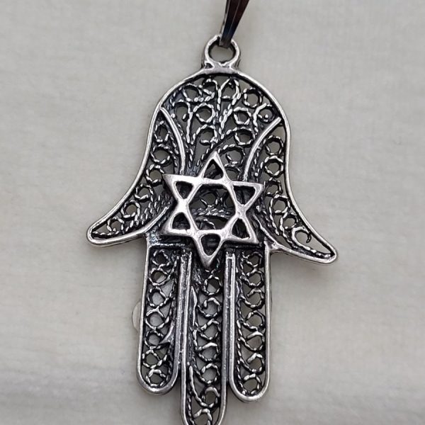 Handmade sterling silver Hamsa  pendant filigree MagenDavid and fine Yemenite filigree design. Dimension 2.5 cm X 4.5 cm X 0.1 cm approximately.