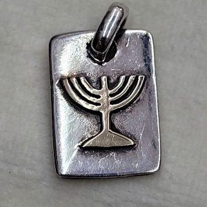 Handmade sterling silver gold Menorah pendant, the Menorah is 14 carat gold soldered on sterling silver pendant 2.1  cm X 1.1  cm X 0.7 cm approximately.