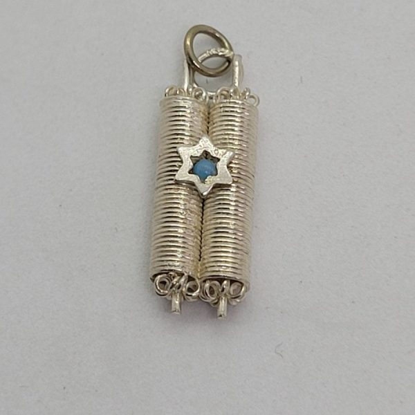 Handmade sterling silver pendant Torah MagenDavid set with Turquoise stone in star of David. Dimension 0.7 cm X 0.4 cm X 2 cm approximately.