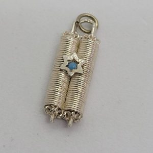 Handmade sterling silver pendant Torah MagenDavid set with Turquoise stone in star of David. Dimension 0.7 cm X 0.4 cm X 2 cm approximately.