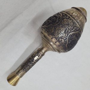 The engravings on vintage Silver Plated Purim Grogger brass and copper are handmade & hammered showing floral and geometric designs.