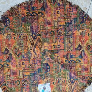 Handmade Druze round tablecloth orange, where each side is as beautiful because of the different shades of orange and yellow colors.