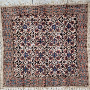 Handmade square Qalamkari cotton tablecloth, where are beautiful because of the different flowers and geometrics skillfully used.  