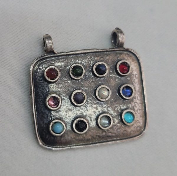 Sterling silver Hoshen breast plate pendant bears colored stones symbolizing the twelve tribes of Israel. Dimension 3.2 cm X 2.8 cm approximately.