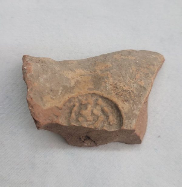 With antique pottery shard designed, owner comes to the great priest and handles him the shard and gets blessed 1.8 cm X 3.5 cm X 5.5 cm approximately.