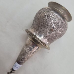 The engravings on vintage brass and copper silver plated Purim ratchet are handmade & hammered showing floral and geometric designs.