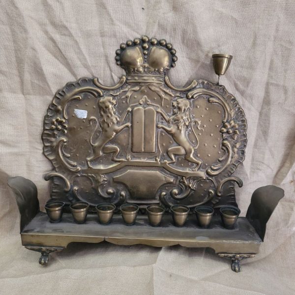 Vintage Hanukah Menorah brass, Bezalel style handmade in Poland 19th century with two lions of Judah embossed 27 cm X 7 cm X 34 cm approximately.