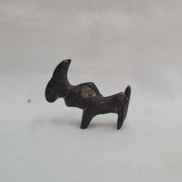 Genuine bronze donkey idol antique small found in the holy land and dated 2000 BC. Dimension 2.8 cm X 2.2 cm X 0.6 cm approximately.