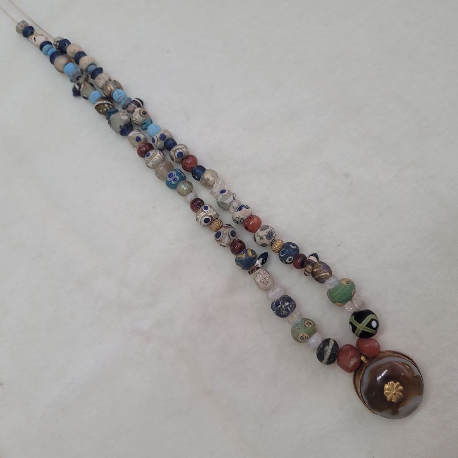 Hand made genuine antique stone beads necklace with Agate stone set in gold and also some blown glass beads and clay beads.