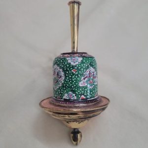 A combined handmade wood base and brass green enameled Hanukah Dreidel hand painted floral & birds designs diameter 5.6 cm X 12 cm.