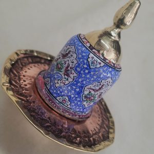 A combined handmade wood base and brass blue enameled Hanukah Dreidel hand painted floral & birds designs diameter 9 cm X 10 cm.